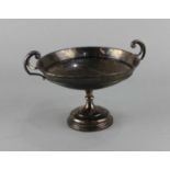 A George V silver circular pedestal bowl with two scroll handles, maker Walker & Hall, Sheffield