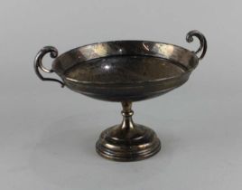 A George V silver circular pedestal bowl with two scroll handles, maker Walker & Hall, Sheffield