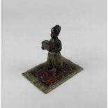 Franz Bergman (Austrian 1861-1936), a cold painted bronze figural group of a child standing on a
