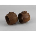 Two Robert Thompson 'Mouseman' oak napkin rings, both carved with mouse signature