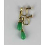 A pair of gold and pale green gem set drop shaped pendant earrings, the screw fittings detailed '