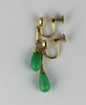A pair of gold and pale green gem set drop shaped pendant earrings, the screw fittings detailed '