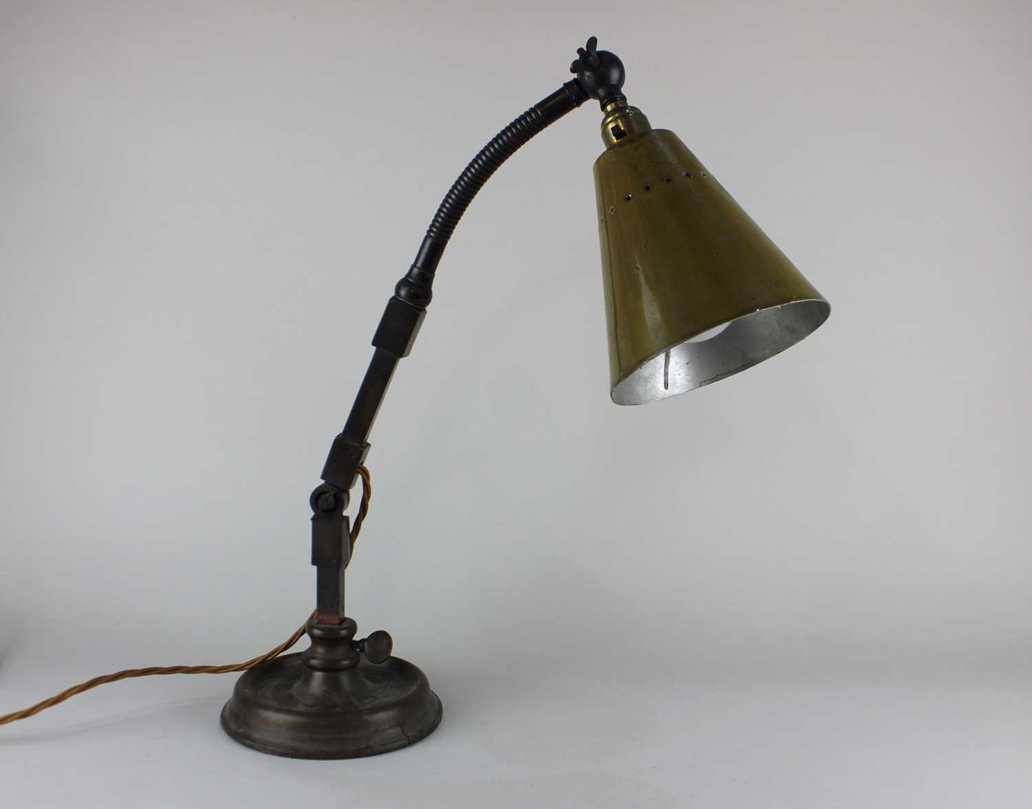 A cool vintage brass and copper anglepoise lamp, unusual model, the cone shaped shade pierced with