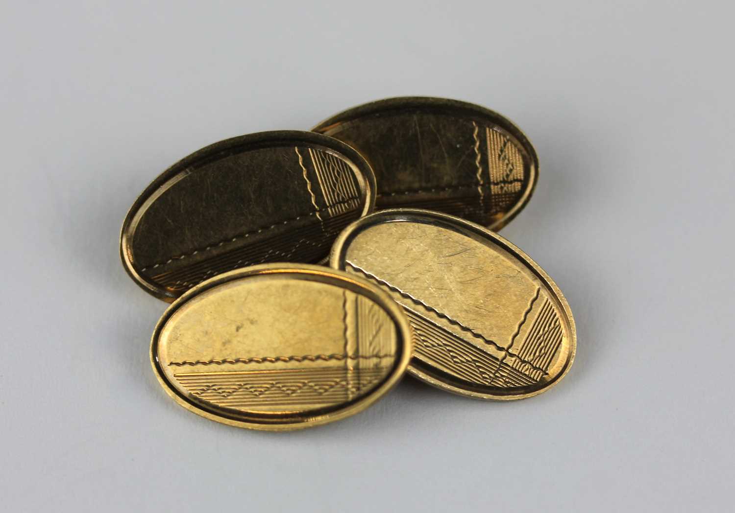 A pair of 9ct gold oval cufflinks 12.1g