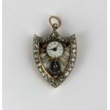 A gold and silver set diamond and enamelled shield shaped pendant watch, the enamelled dial with