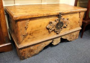 A Spanish pine coffer, late 19th / early 20th century, with carved and applied decoration, 130cm