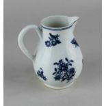An 18th century Caughley blue and white porcelain milk jug baluster shape decorated with flowers and