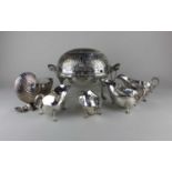 A Victorian silver plated nautilus shell spoon warmer four sauce boats and an oval breakfast