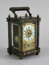 A Victorian alarm carriage clock, the gilt metal case decorated with paste jewels, enamelled chapter