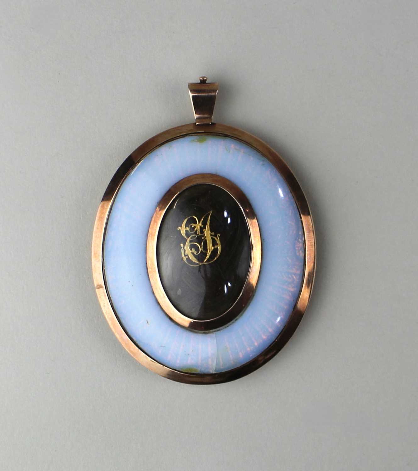 A gold mounted oval portrait miniature of a gentleman with curly pale brown hair wearing a black - Image 2 of 2