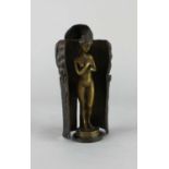 A metamorphic erotic bronze of an owl enclosing a nude girl, in the style of Franz Bergman, 19cm