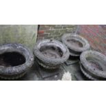 A set of four reconstituted stone Campana garden urn planters each with drainage hole 55cm high