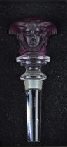 A Versace Rosenthal crystal 'Medusa' wine bottle stopper with frosted amethyst glass head 12.5cm,
