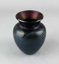 An Okra iridescent glass vase with swirled design, the base engraved 'Okra Glass Guild Founder