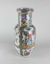 A Chinese Cantonese porcelain vase decorated with alternate figure and bird panels, surrounded by