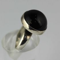 A Georg Jensen silver and black onyx ring detailed '925 S 123G'