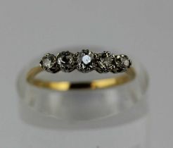 A gold and diamond five stone ring mounted with a row of graduated cushion shaped diamonds,