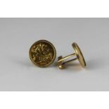 A pair of gold mounted sovereign cufflinks the sovereigns 1997 and 2000, with a case, combined gross