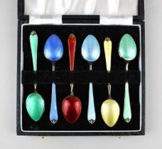 A cased set of 6 enamelled silver-gilt coffee spoons, Adie Brothers Ltd, Birmingham 1956.