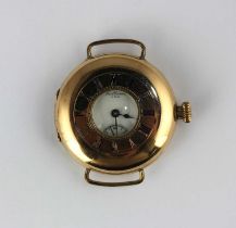 A 15ct gold half hunt in case wristwatch, the jewelled lever movement detailed 'A.W.W. Co. LADY