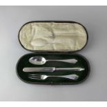A cased George V silver three piece Christening set of knife, fork and spoon in fitted case marked