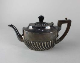 A Victorian silver Batchelor teapot oval demi reeded form, maker George Howson Sheffield 1900, gross