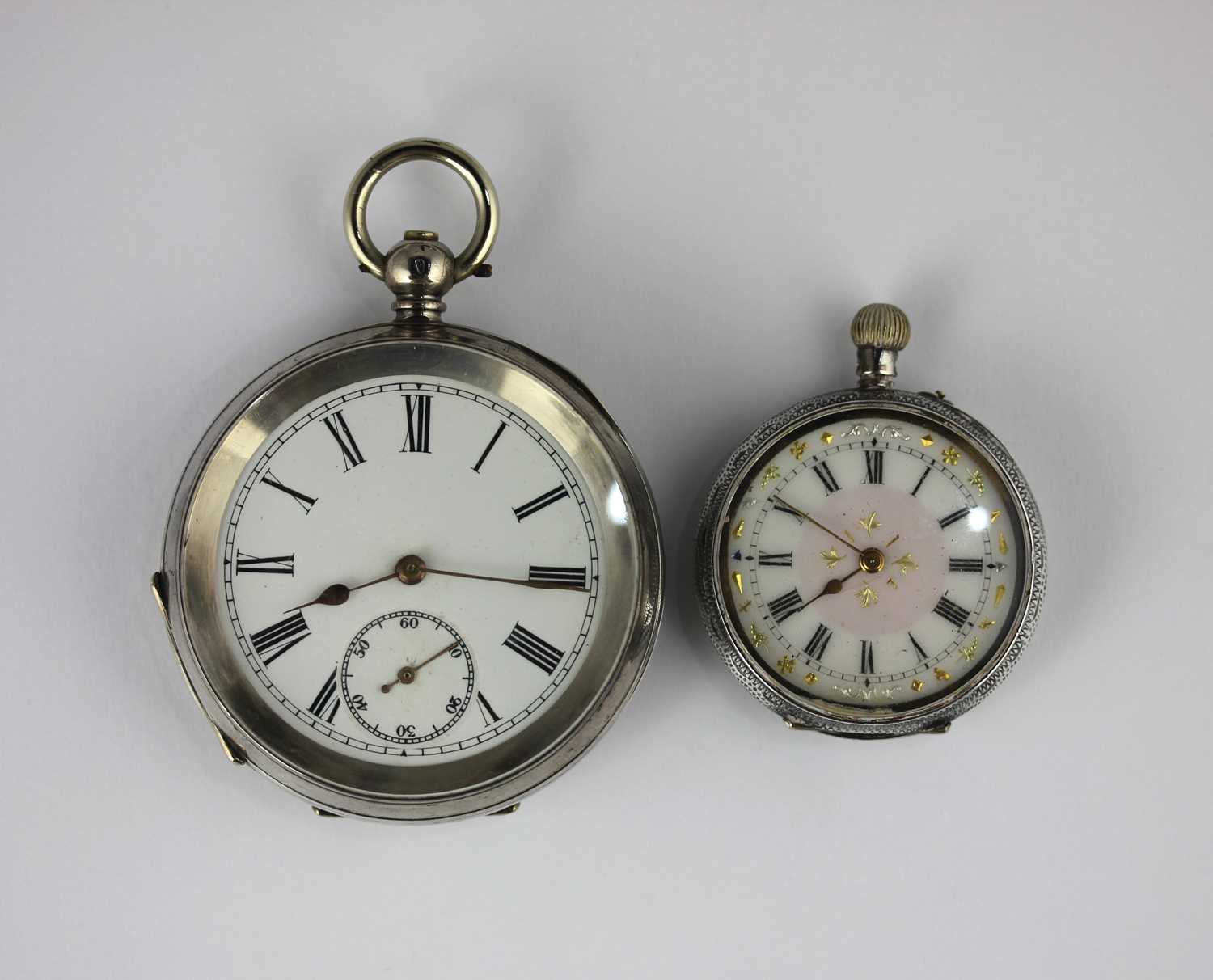 A silver cased key wind open faced gentleman's pocket watch, the enamel dial with Roman numerals,