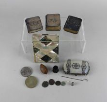 A Victorian Mother of Pearl card case three silver miniature books including Common Prayer, a mother