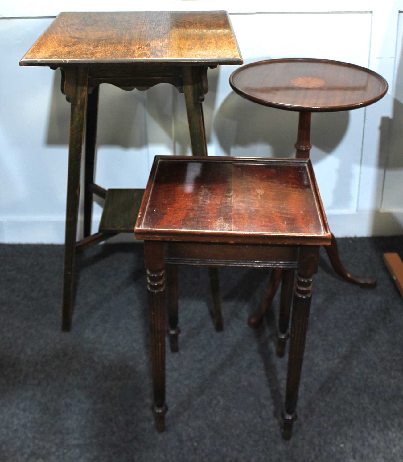 An Edwardian mahogany inlaid tripod table, the dished circular top with central batwing patera 36.
