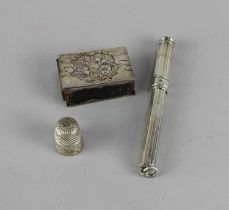 A Victorian silver retractable pencil maker Frederick Edmonds, London 1896, 10cm, a thimble, Chester