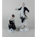 Two Royal Dux porcelain figures of a gentleman and a lady in 18th century style costume tallest 23cm