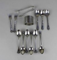 A set of six George V silver teaspoons and tongs with a shell pattern Joseph Rodgers & Sons
