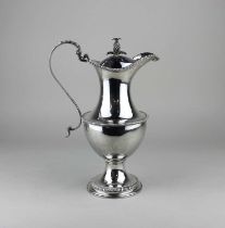 A George III silver wine ewer, being of classical form with a pineapple finial to the hinged lid and