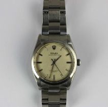 A Rolex Oyster Perpetual steel gentleman’s bracelet wristwatch the signed silvered dial with baton