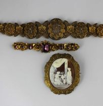 A Victorian gilt metal mounted oval shell cameo brooch carved as a classical interior scene with two