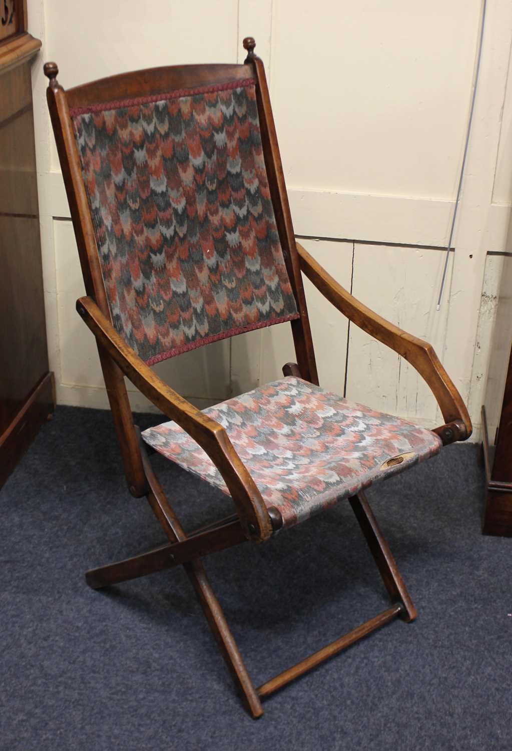A late 19th / early 20th century folding steamer chair, jointed beech frame with upholstered back