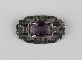 An amethyst and marcasite brooch pierced in a geometric openwork design, detailed '800'