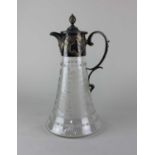 A Victorian etched glass claret jug tapered form with silver plated mount and scroll handle