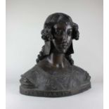 A Renaissance style bronze bust of a young woman, wearing a coif and embroidered bodice, the base