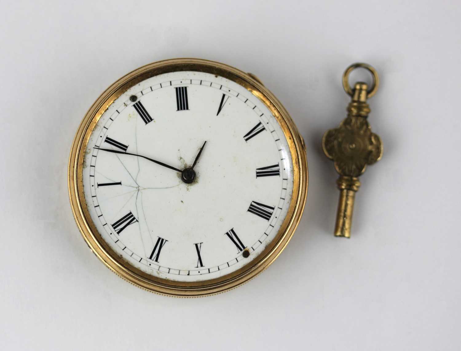 A gold cased key wind open faced lady's fob watch, with a gilt metal inner case, the outer case with