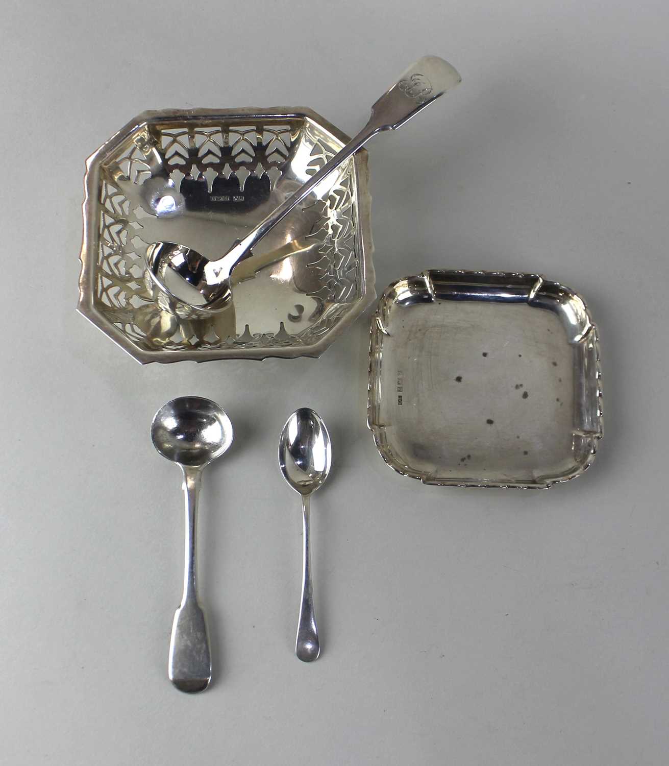 A mid 20th century small silver dish with pierced sides, Birmingham 1950, another small square