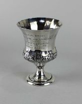 A George IV silver trophy goblet faceted form with embossed foliage, presentation inscription, maker