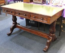 A Victorian mahogany library table, with green leather inset rectangular top above three drawers