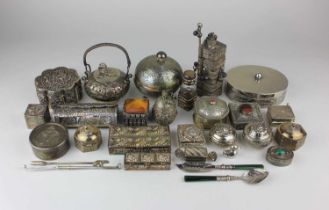 A collection of approx thirty two mostly eastern white metal boxes and receptacles, some hallmarked,