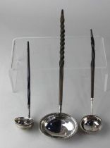 A George III silver brandy ladle oval bowl with beaded rim and engraved initials, London 1791, 26.