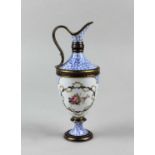 A Royal Crown Derby porcelain ewer with floral decoration and gilt embellishments 18cm high