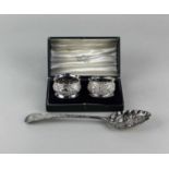 A George III silver berry spoon with later pressed decoration, London 1799, 22cm and a cased pair of