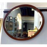 An Edwardian satinwood and mahogany framed oval wall mirror bevelled mirror plate 71cm by 57cm