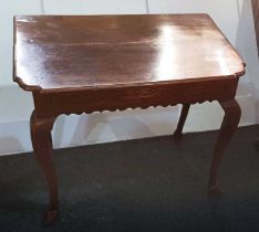 A George III oak side table with frieze drawer and wavy apron, on cabriole legs 74cm