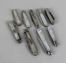 Seven silver bladed fruit knives with mother of pearl handles and two silver cased pocked knives,